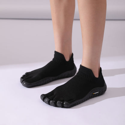 Suela zero drop flexible del calzado minimalista Obsidian Black para una pisada natural.